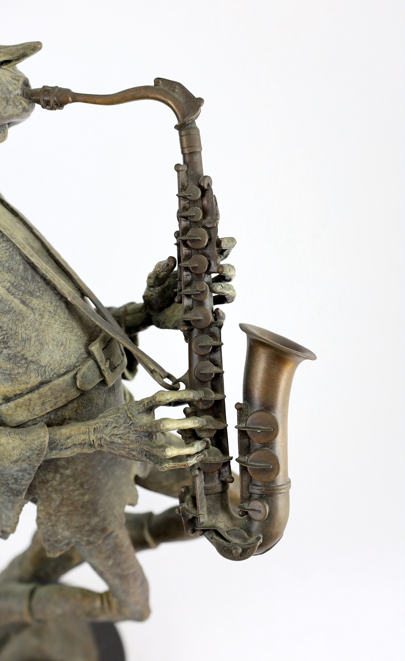 David Goode (British, b.1966). A bronze of a pixie saxophone player, height 61cm